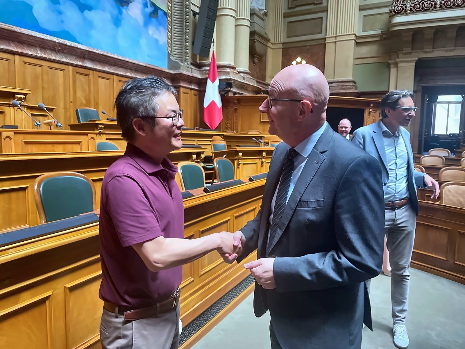 OttoAI representative at the Swiss Parliament building in Bern